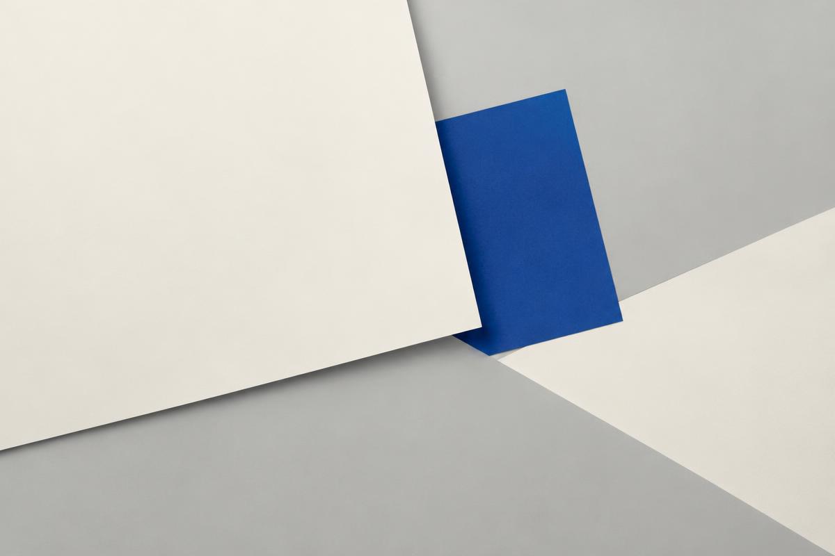 Overlapping paper planes with a single blue rectangle